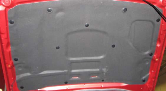 Use a panel puller to pry off the thirteen push-pins retaining the hood insulator and set the insulator aside.