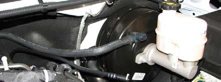 Then unravel the retainer bracket from the engine harness to remove the retainer bracket completely (if