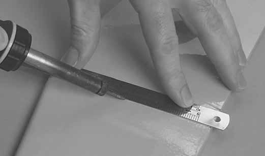 The hotter the soldering iron, the faster it must travel to melt a fine cut. Peel off the covering. 4. A mark has been provided in the center of the front former.