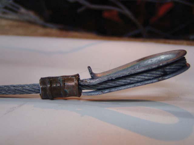 SECTION E: CABLES In your repair assessment, you may encounter thimbles that are bent, twisted or have begun to stretch as shown in picture below. Some elongation of the Thimbles may occur in use.