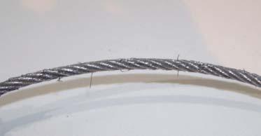 SECTION E: CABLES Frayed wires on the Riser cable or