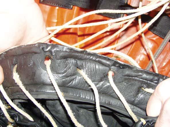 Examine the neoprene rubber for any tears, broken stitching, and check that the main seam is still glued together. If the seam or stitching comes apart, the valve will not seal properly.