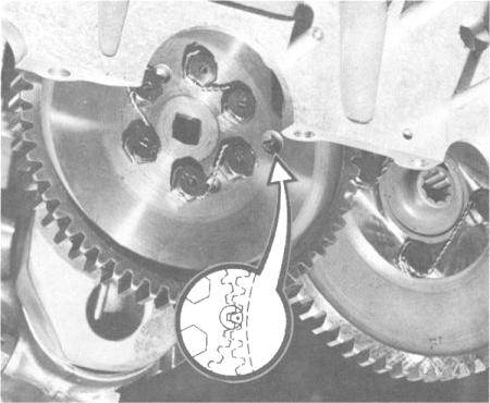 Lay camshaft assembly in its bearings in left crankcase, meshing spur gear teeth with those of crankshaft gear so that timing marks are aligned in the manner illustrated in Figure 8-, and turning