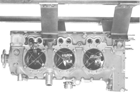 q. Attach right crankcase mount brackets to the assembly stand and rotate stand until engine is upright as shown in Figure 8-. r. Install generator mount bracket (3) and secure with attaching parts ( through 30).