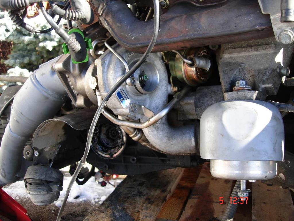 Page 10 of 14 -Install the new manifolds (if you pulled the old ones) using a new mani-cylinder head gasket.