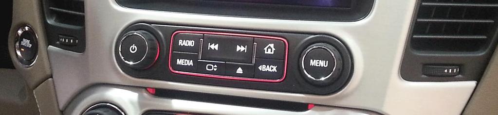 Dash Disassembly (Yukon) 1. Begin by raising the monitor with the button shown below (ignition is not required).