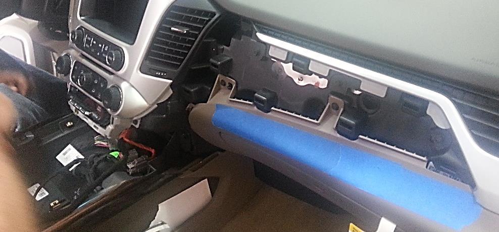 It is secured with clips only and pulls straight out (towards the rear of the vehicle). 3.