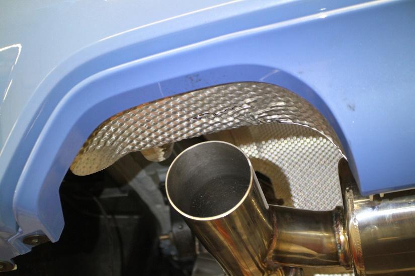 Check the positioning of the rear muffler outlets.