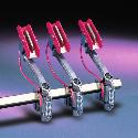 CURRENT COLLECTORS Slide type collectors are used for shielded figure conductor bar systems.