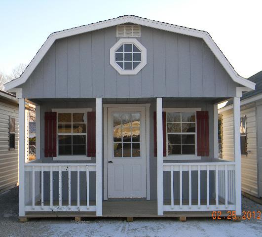 2016 the Gambrel Barn with Porch 6' Porch is Standard and included in size of building Price includes 1-60'' wood door and 1-30'' wood door Area over porch is