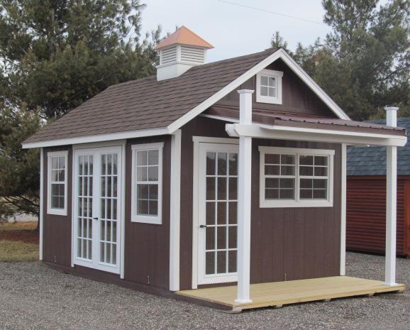 Wide - 6' SW, 8/12 Roof Pitch 14' Wide - 6' SW, 7/12 Roof Pitch the Garden Shed with Porch BASE PRICE INCLUDES: 1-30'' Door 1-60 Door 2-18''X 23'' Windows 4' Porch w/metal Roof & 2-4x4 Vinyl Posts