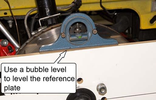 NOTE: The reference plate will not remain parallel as the suspension is cycled.