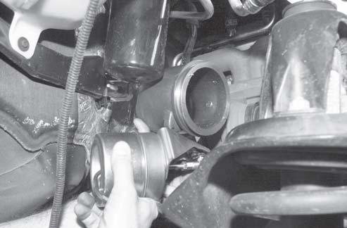 Torque (11 mm socket) the V clamp between the brake