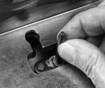 Remove the lower clocking link retaining plug. Use a 5/8 allen wrench. 9.