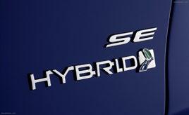 There is a Hybrid nameplate on the trunk lid (located on the right hand side) that also includes the green leaf/blue