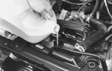 3. Fill the radiator with the proper coolant mixture, up to the base of the filler neck.