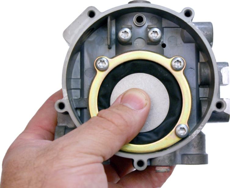 6. Push down on the vacuum-lock diaphragm (15) and hold a finger over the vacuum connection on the front of the regulator (below VAC on the regulator face).
