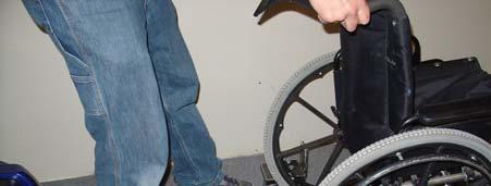 LOAD WHEELCHAIR BASE Load the occupant onto the wheelchair trainer base for