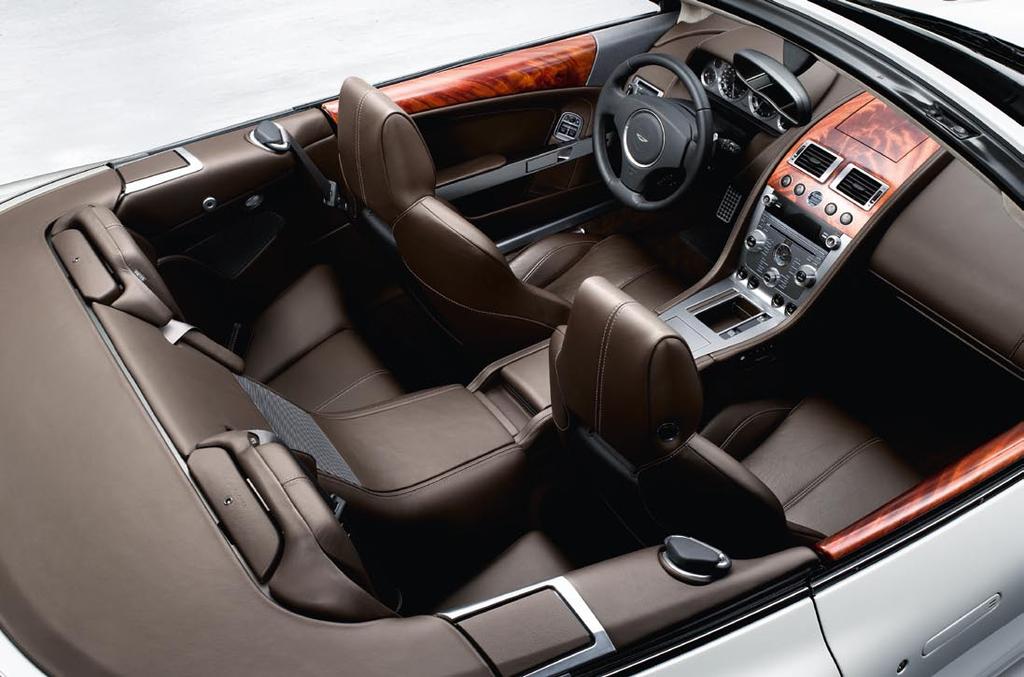 50 An Aston Martin is about style and elegance, and nowhere is this more evident than in the DB9 s cabin, with its supportive seats, deep centre console and rich palette of luxurious finishes,