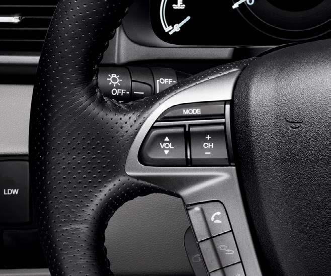 STEERING WHEEL-MOUNTED CONTROLS Change the music or answer a phone call with