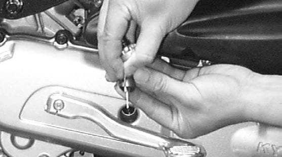 11. CARBURETOR Remove the jet needle by removing the needle clip. Check the jet needle and throttle valve for wear or damage.