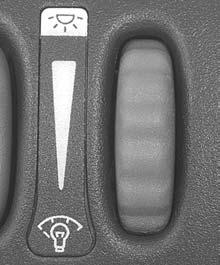 Interior Lamps Instrument Panel Brightness The thumbwheel for this feature is located on the instrument panel to the left of the steering column. Push the top of the button to turn the fog lamps on.