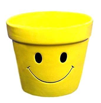 smiley face pottery 3.75"x4" 4.