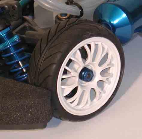 Tires & Wheels Wheels Associated provides 1-piece 24mm wheels (fig. 1). The standard hex wheels are made for 4mm axles. No offset comes with the NTC3 wheels.