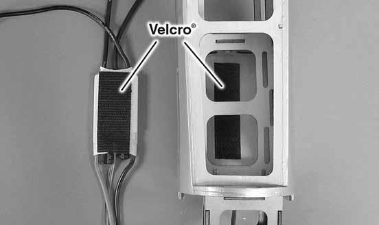 10. Install your battery, securing it with the included Velcro