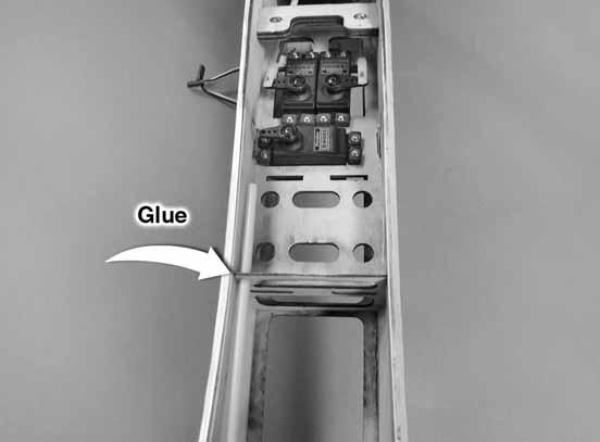 former. Apply a drop of glue to the tube where it passes through the fi rewall and the former in the fuselage.