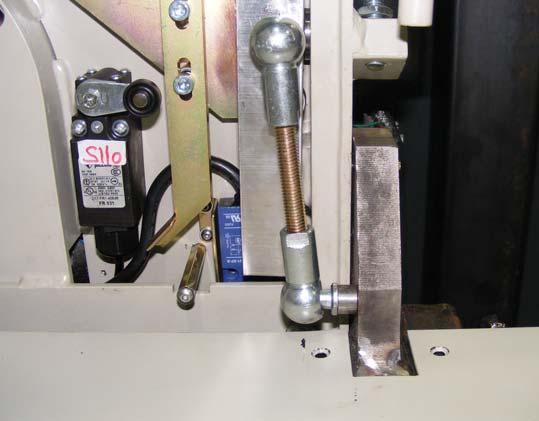Figure 78 Adjust screws for arms (manual unit shown) Step 15 Connect and adjust platform ramps Connect and adjust the platform loading ramps.