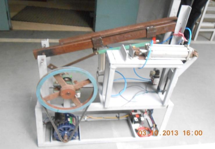 The base setup consists of the AC motor and the setup which consists of the pneumatic chuck.