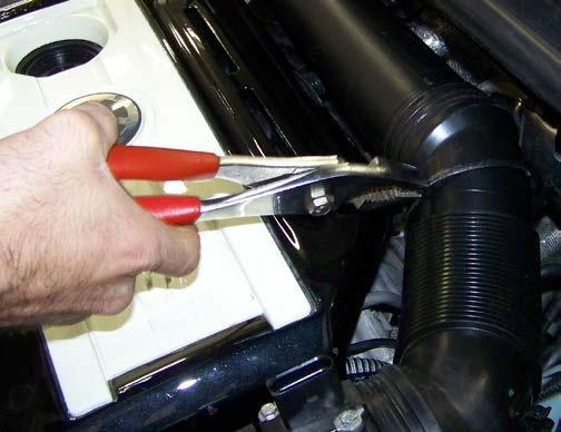 eaching the Clutch Bleeder Block emove the Spring Clamp Using pliers or a spring clamp tool, remove