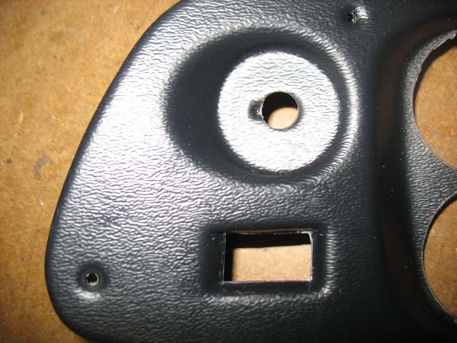 Also, using a razor knife carefully cut away the rectangular opening for mounting the wiper switch.