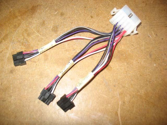 ground lines are soldered together at one contact and the dashboard illumination lines are soldered together at one contact. The sensor wires are then installed individually.