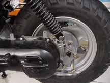 Test the rear brake by applying pressure to the brake lever. Try pushing the vehicle with the brakes applied. If the rear wheel turns the brakes may need to be adjusted or replaced. 1.