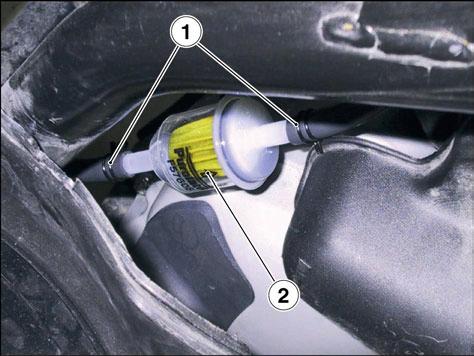 FUEL SYSTEM ATLANTIC 125-200 4.1.2. CHANGING THE FUEL FILTER Carefully read 1.2.1. and 1.3.1. Put a cloth under the fuel filter.