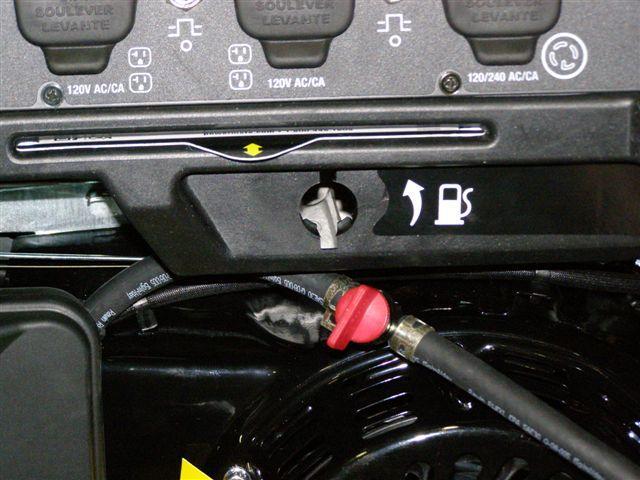 Remove Shut-off Valve Remove the fuel shut-off from under the front control panel by