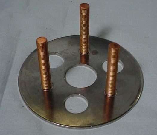 the opposite side of the movable contact button. To help in identifying the slip ring see Figure 21.