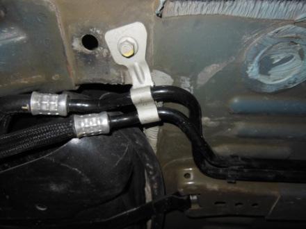 STEP 14: Add heat shroud tape to rear axle cooler