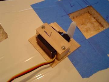 25in) in cross section The idea is to restrain your servo s movement with the blocks and hold it down with the ply