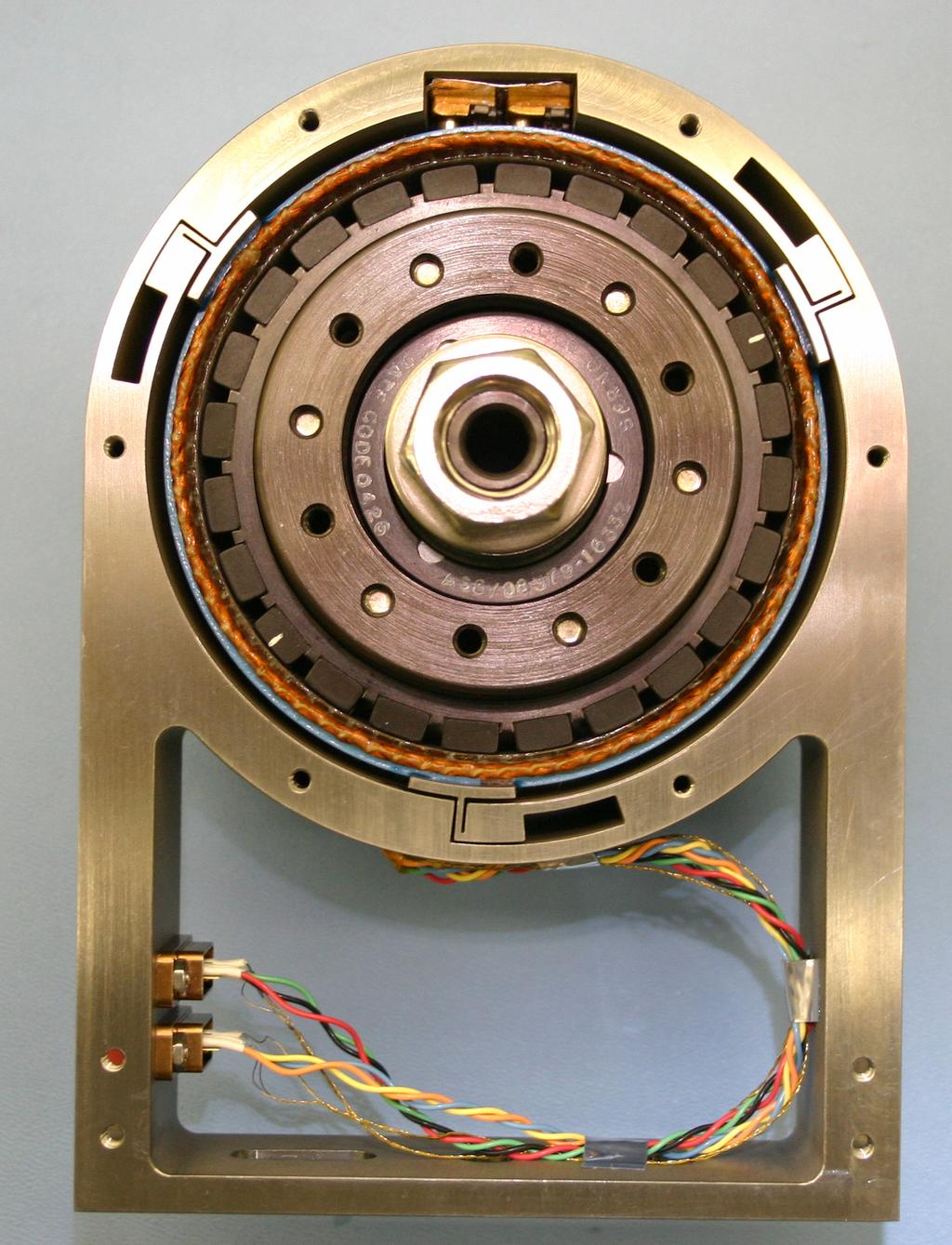 identical to those of the proposed flight bearings. Inductive sensors were successfully used to provide position feedback. Figure 8: Filter Wheel Assembly Prototype 3.