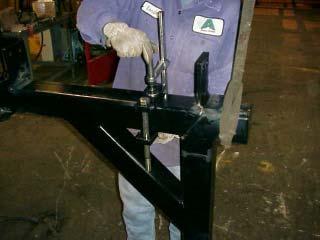 Frame Rail Installation Tack Welding Frame Rails: (continued) 8. Weld Bar Mounting Straps.