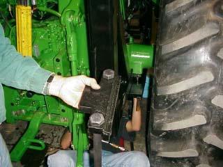 (See Figure 5, 6 & 7) When the Bolts are installed into the Frame Rail & Boom Rest Plates and snugged up to Axle housing, install the RH Axle Mounting Strap (See Figure 8, 9 & 10).