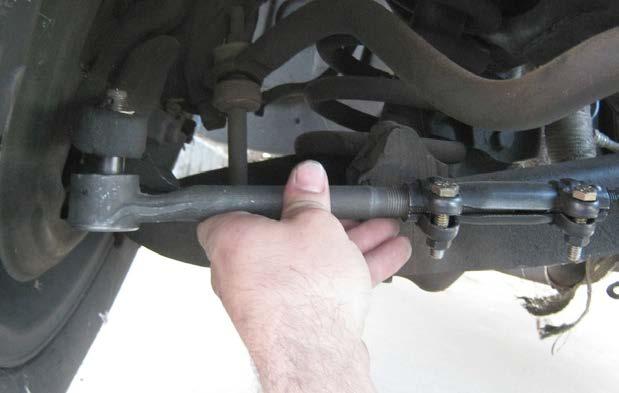 Next install the outer tie rod ends into the adjuster sleeves and adjust tie