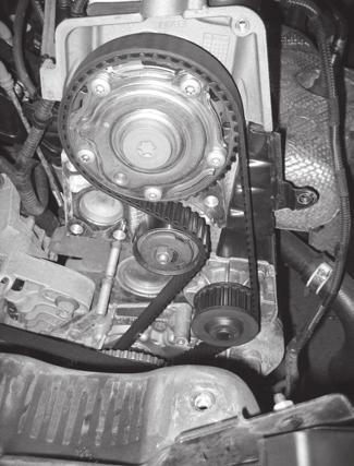 Rotate the crankshaft to engine timing position and check the camshaft timing is correct by temporarily inserting AST4952 Setting Plate in to the slot at the rear of the camshaft, ensuring the