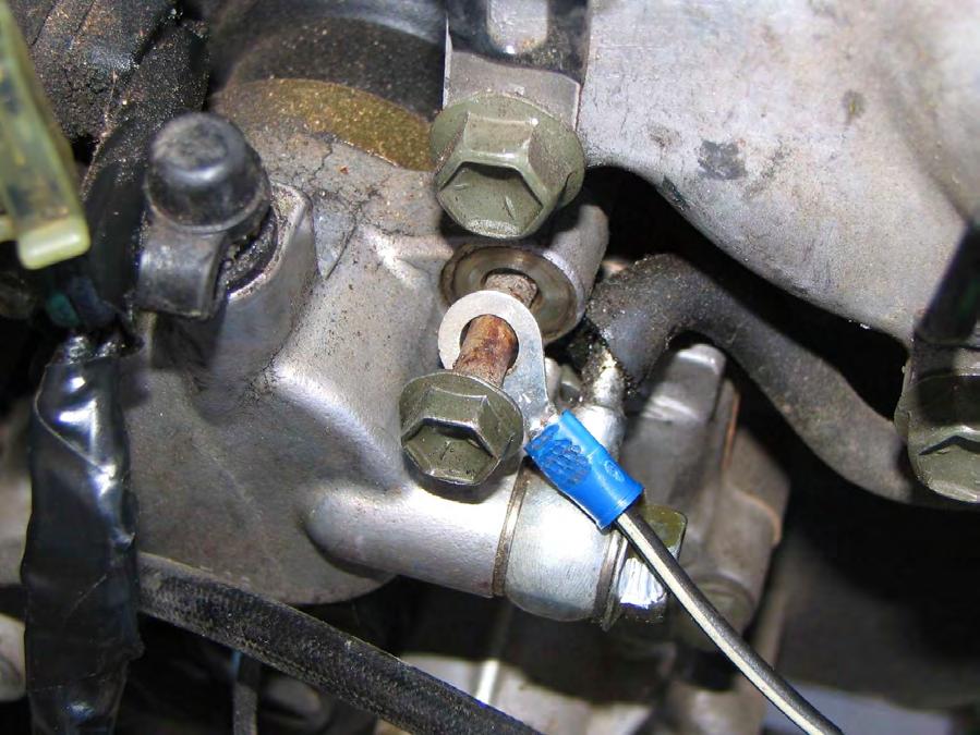 Remove the right hand side hold down bolt on the clutch slave cylinder
