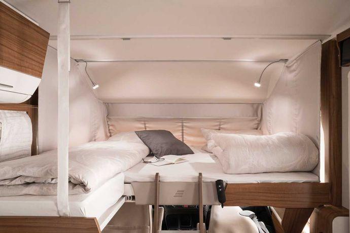 The transverse double bed is typical of the fold-down beds found in integrated motorhomes.