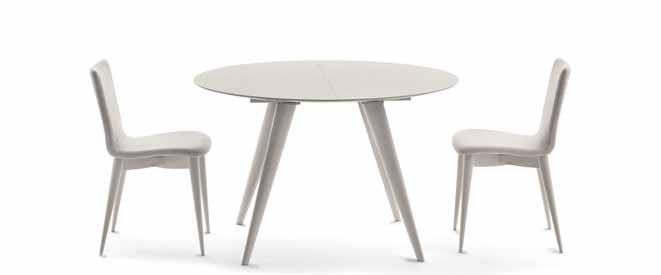 EXTENDIBLE ROUND DINING TABLE WITH LEGS IN SOLID ASH.