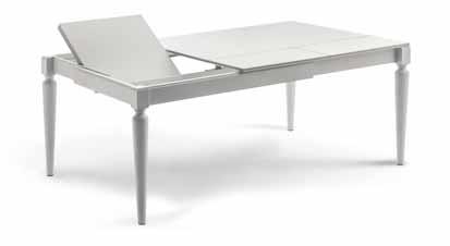 FOTO: FINITURA LACCATO BIANCO OPACO PORO APERTO RECTANGULAR TABLE, EXTENDA- BLE BOTH IN WIDTH AND LENGTH, WITH EXTENSIONS HOUSED INSIDE. STRUCTURE IN SOLID ASH.